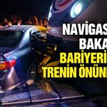Navigasyona bakarken bariyeri kırdı, trenin önüne çıktı