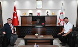 Prof. Dr. İsmail Hakkı Özölçer, Prof. Dr. Adem Akpınar’ı makamında kabul etti