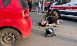 Otomobille çarpışan motosiklet sürücüsü yaralandı