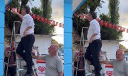Üç kişi merdiveni tuttu: Tahsin Erdem boyadı!