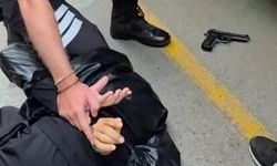 Yaz ortasında montu şüphe uyandırdı, üzerinden tabanca çıktı