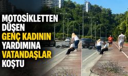 Motosikletten düşen genç kadının yardımına vatandaşlar koştu