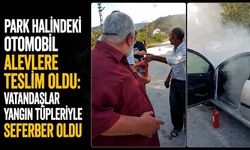 Park halindeki otomobil alevlere teslim oldu: Vatandaşlar yangın tüpleriyle seferber oldu