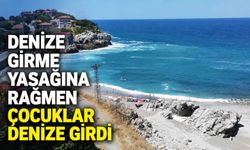 Denize girme yasağına rağmen çocuklar denize girdi