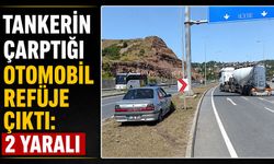 Tankerin çarptığı otomobil refüje çıktı: 2 yaralı