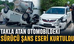 Takla atan otomobildeki sürücü şans eseri kurtuldu
