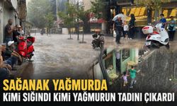 Sağanak yağmurda kimi sığındı kimi yağmurun tadını çıkardı