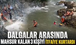 Dalgalar arasında mahsur kalan 3 kişiyi itfaiye kurtardı