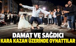 Damat ve sağdıcı kara kazan üzerinde oynattılar