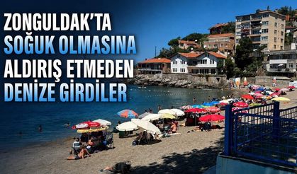 Zonguldak'ta soğuk olmasına aldırış etmeden denize girdiler