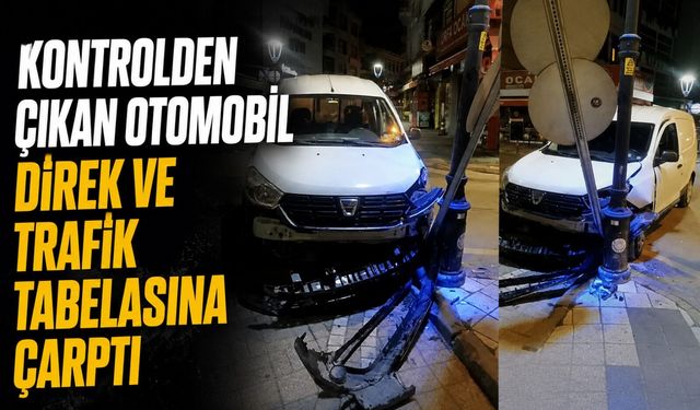 Kontrolden çıkan otomobil direk ve trafik tabelasına çarptı