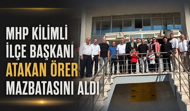 MHP Kilimli İlçe Başkanı Atakan Örer mazbatasını aldı