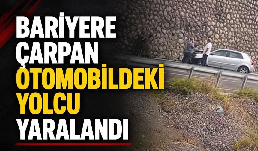 Bariyere çarpan otomobildeki yolcu yaralandı