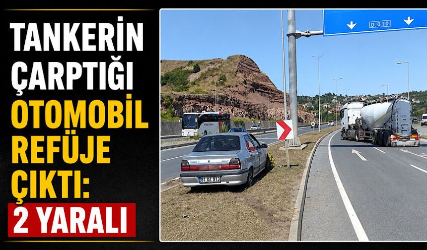 Tankerin çarptığı otomobil refüje çıktı: 2 yaralı