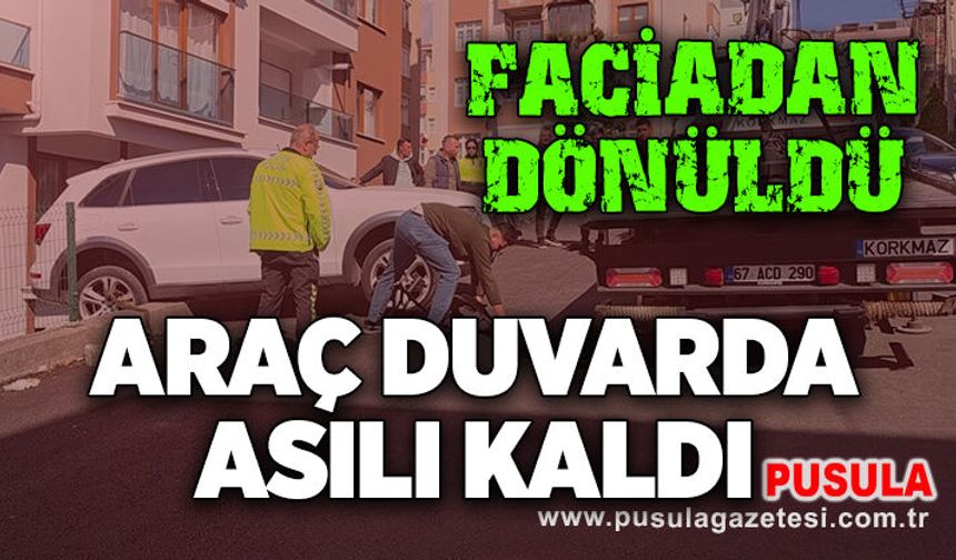 Faciadan dönüldü: Araç duvarda asılı kaldı